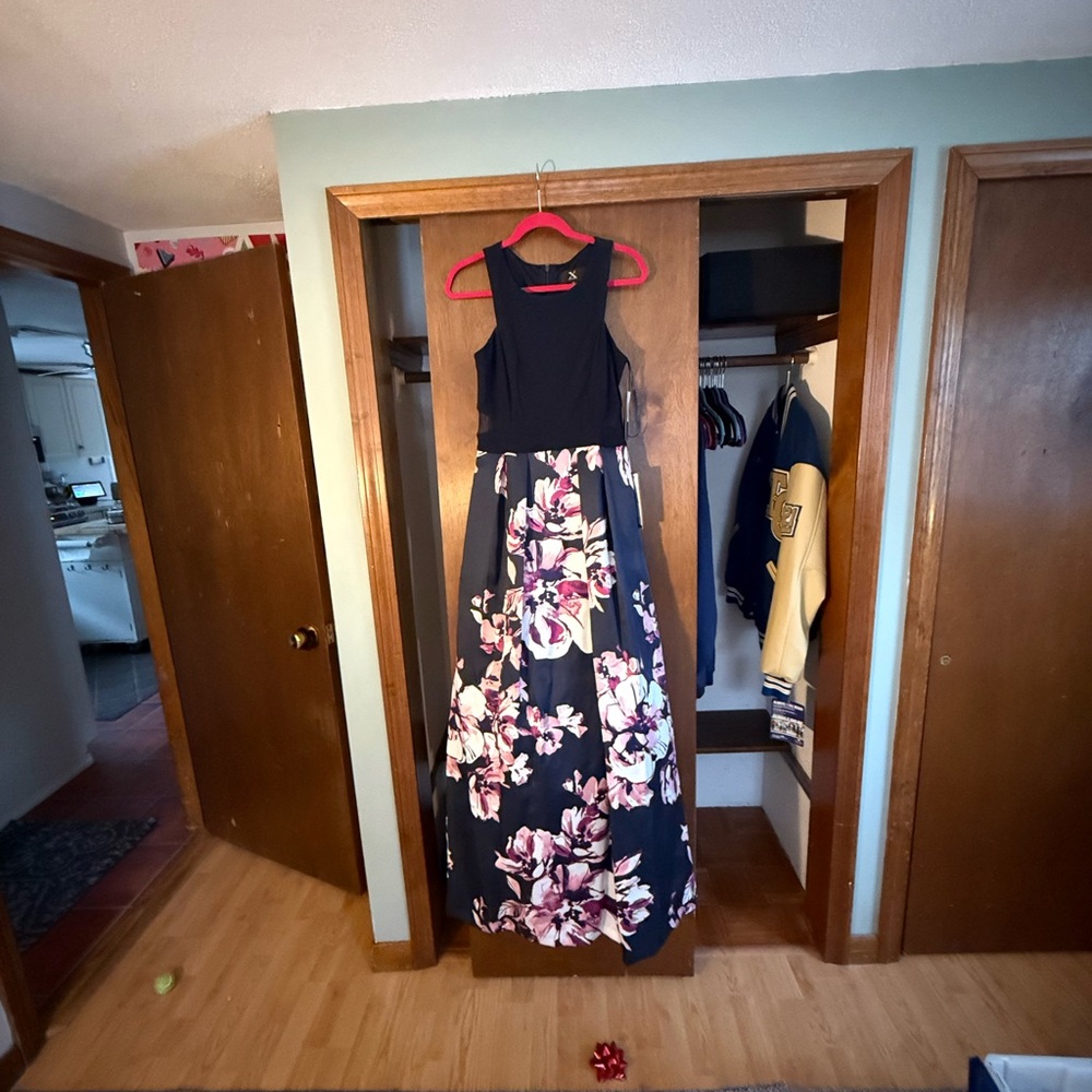 Brand New size 8 Xscape long dress for a formal dance, prom or wedding